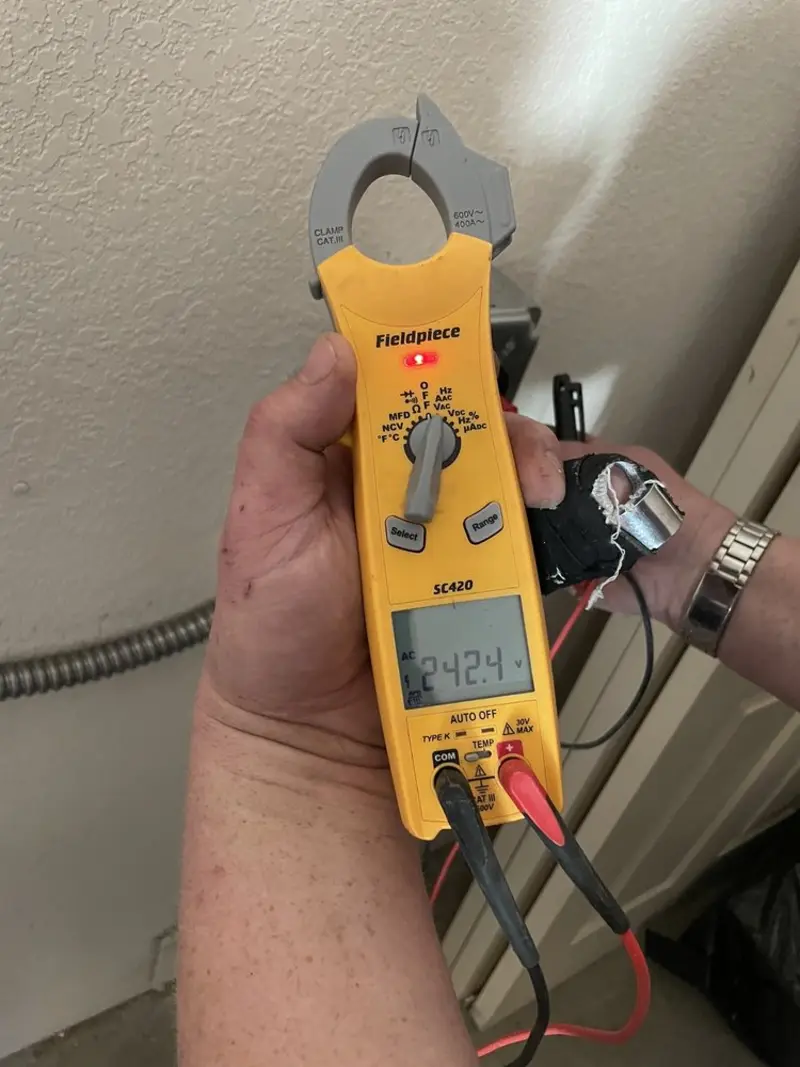 Voltage testing with clamp meter during Generator Installation in Meiners Oaks